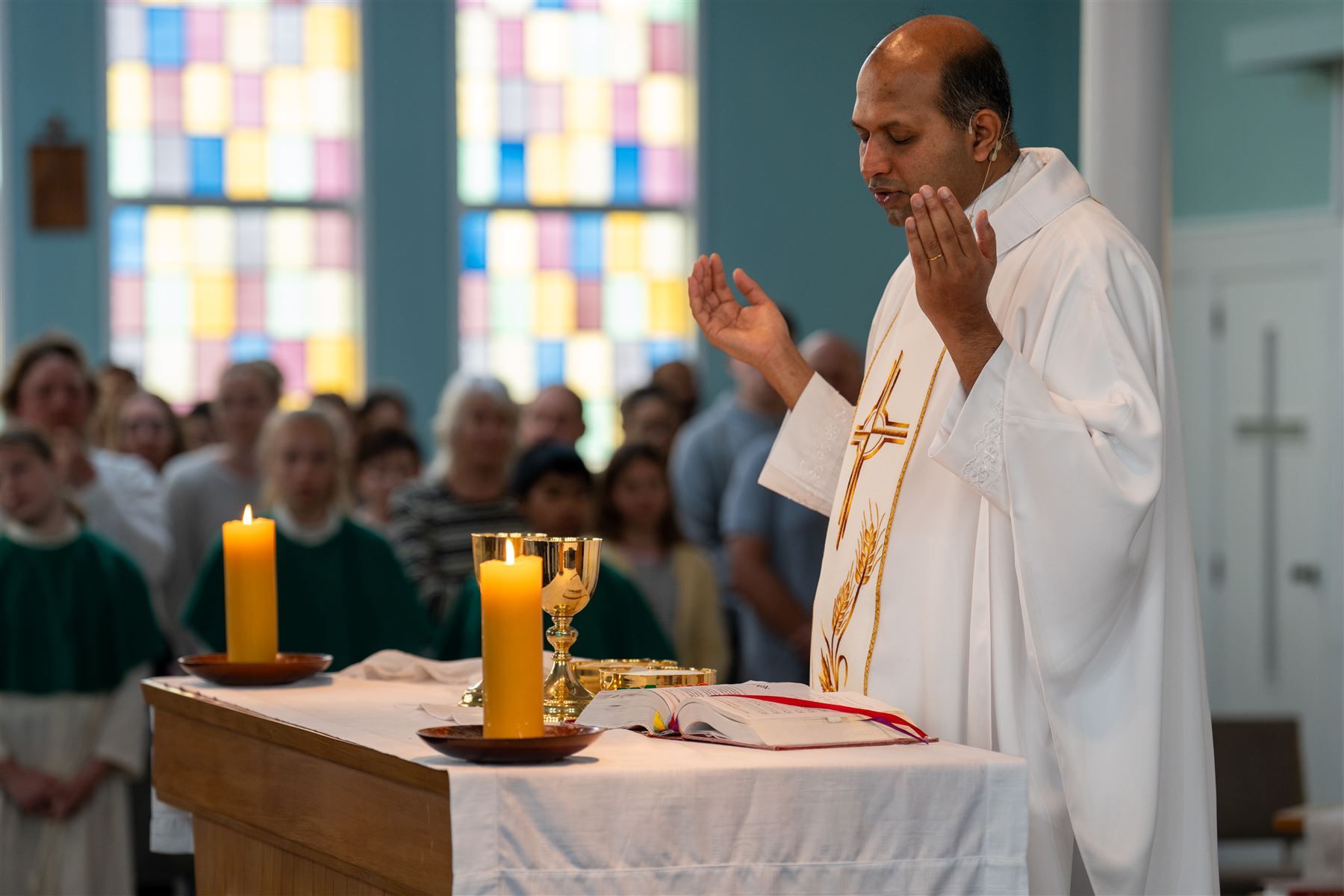 Priest celebrating Mass at the altar