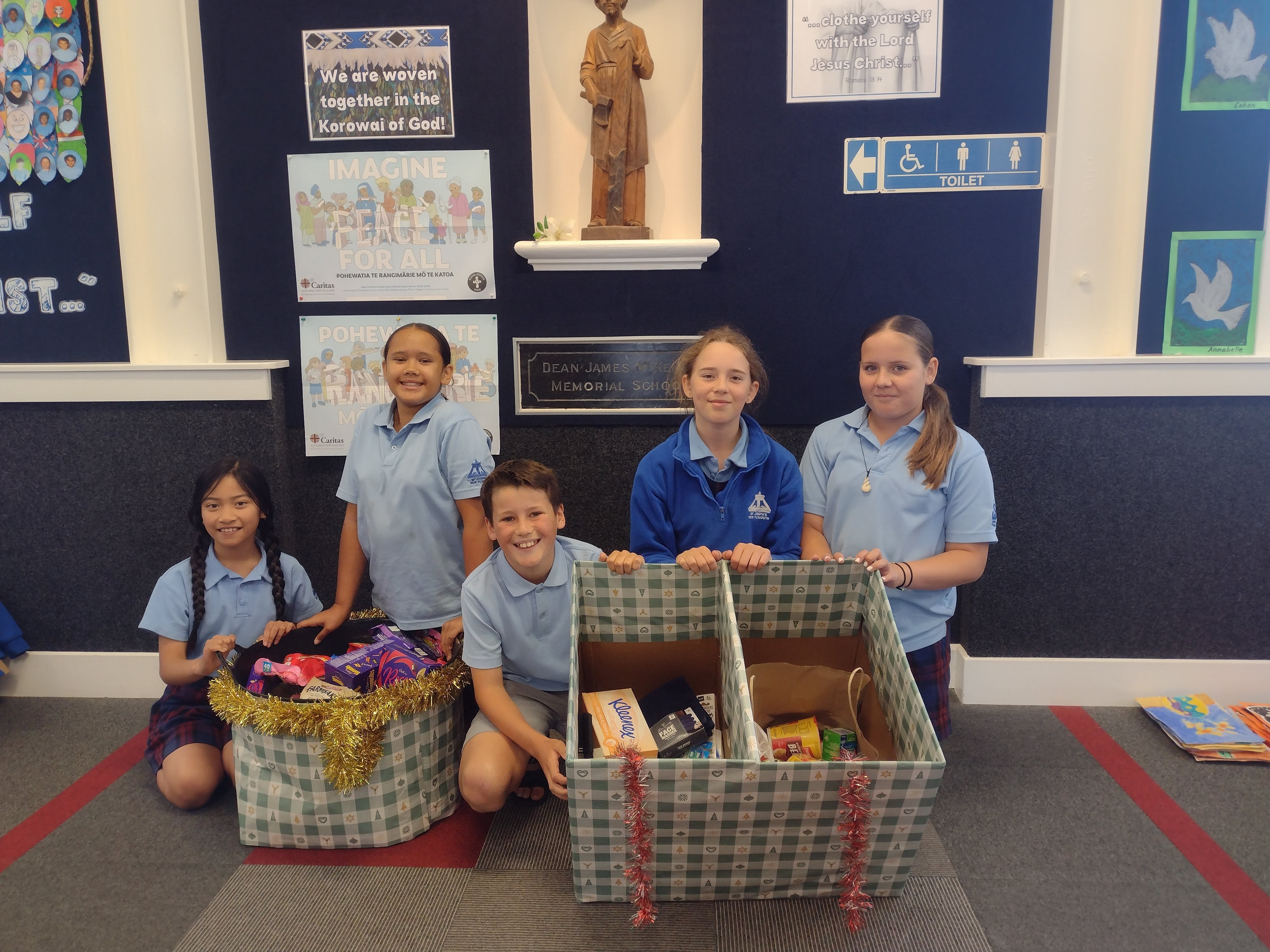 Young Vinnies with donation boxes for those in need